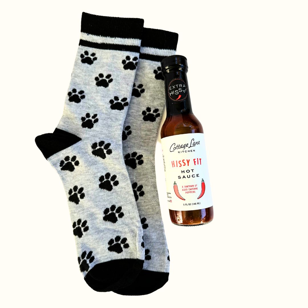 Hissy Fit Hot Sauce with Socks with Dog Paws on them