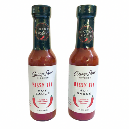 Two bottles of Extra Hissy Hissy Fit Hot Sauce with White Background