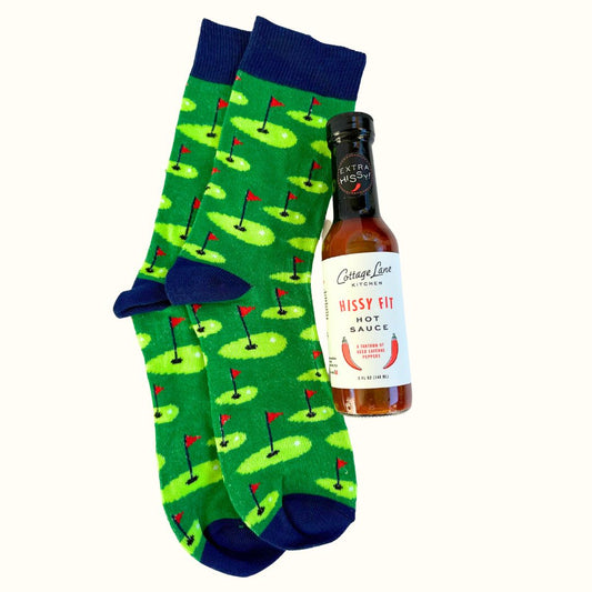 Hissy Fit Hot Sauce with green and blue Socks with golf courses on them