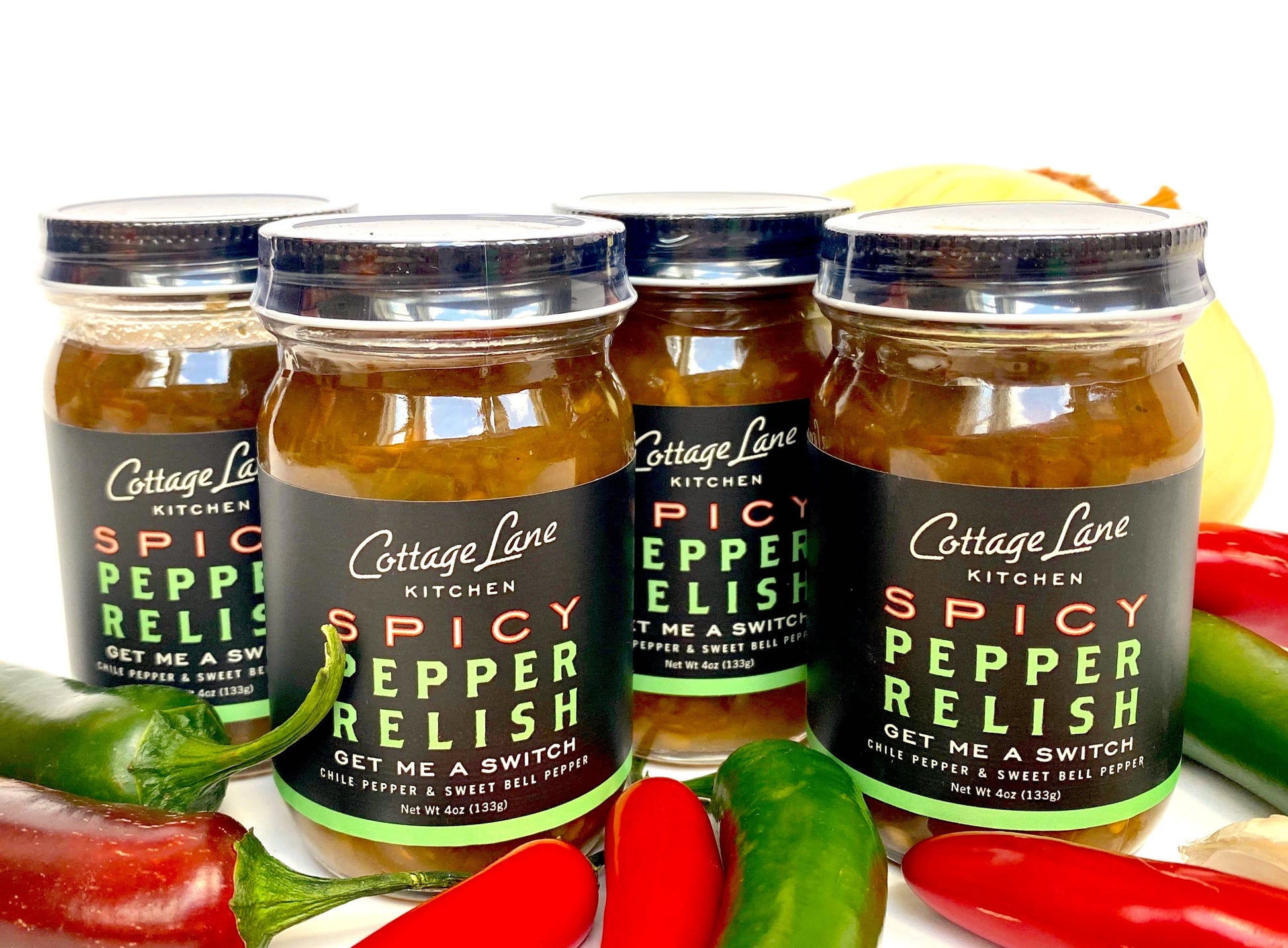 four 4oz bottles of get me a switch spicy pepper relish by cottage lane kitchen